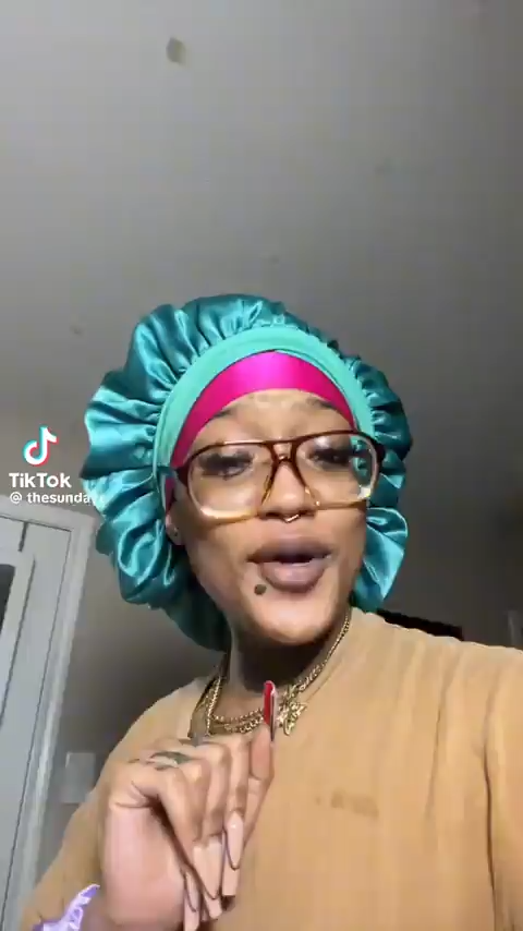 image of black woman speaking to camera